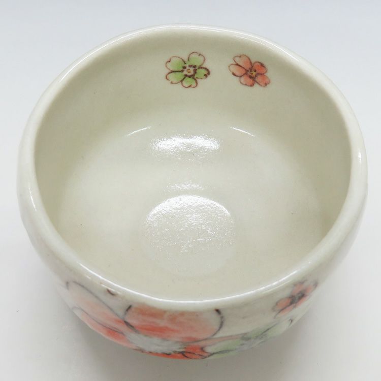 茶道具 小茶碗（こちゃわん） 小茶碗 花模様・オレンジ 豊窯 抹茶茶碗は茶の湯文化である表千家・裏千家の茶道具や抹茶を専門に扱う千紀園（せんきえん）が通販で販売しています。茶会また初心者向けのお稽古用にご利用いただける抹茶碗です。贈り物・ギフトにも人気です。